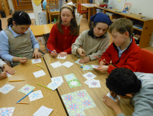 Students learn how to make geometric tiles with compass and straight edge.